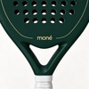 Close-up of the Forest dark green padel racket throat, with the gold moné logo and outline above its open triangle