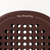 Play Beautifully printed in beige at the top of the Cocoa brown padel racket, above its drilled hole pattern