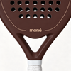 Close-up of the Cocoa brown padel racket throat, with the beige moné logo and outline above its open triangle
