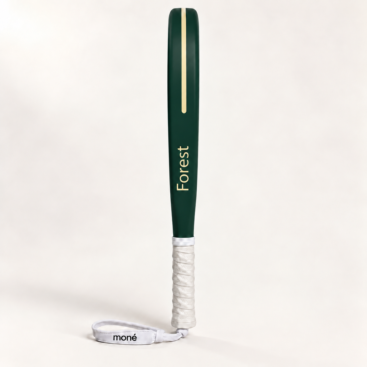 Forest dark green padel racket in side profile, with Forest printed in gold along the frame, a white grip and wrist strap
