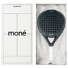 Luxury unboxing of the designer Moné Padel Forest racket inside a premium white presentation box.