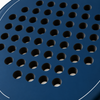 Macro of the Sailor blue padel racket face, showing its matte finish, drilled hole pattern and thin white outline