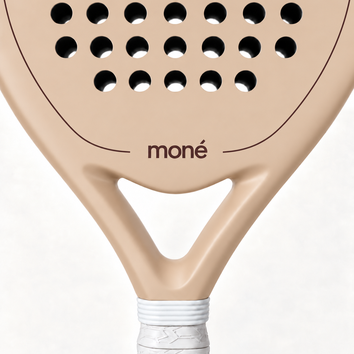 Close-up of the Sahara beige padel racket throat, with the cocoa brown moné logo and outline above its open triangle