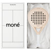 Luxury unboxing of the designer Moné Padel Sahara racket inside a premium white presentation box.