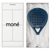 Luxury unboxing of the designer Moné Padel racket inside a premium white presentation box.