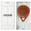 Luxury unboxing of the designer Moné Padel Sienna racket inside a premium white presentation box.