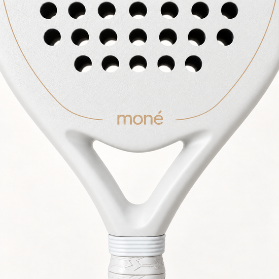 Open triangle throat of the Ivory Hybrid padel racket, a gold logo and outline set against the off-white frame