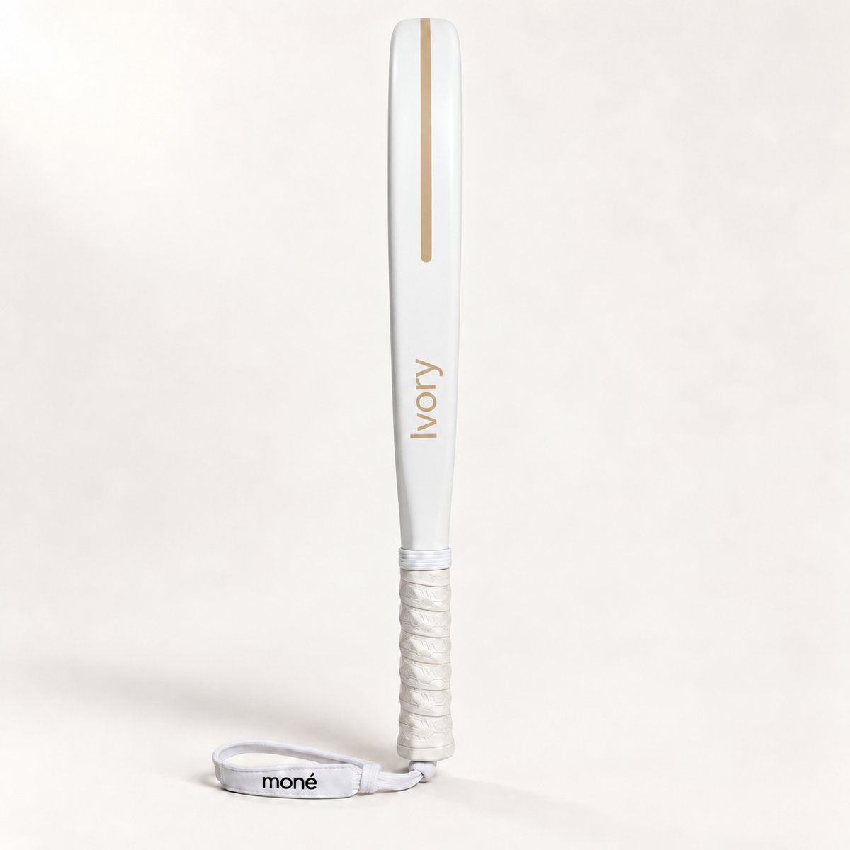 Side profile of the off-white Ivory Hybrid padel racket, its name and a stripe printed in gold along the frame