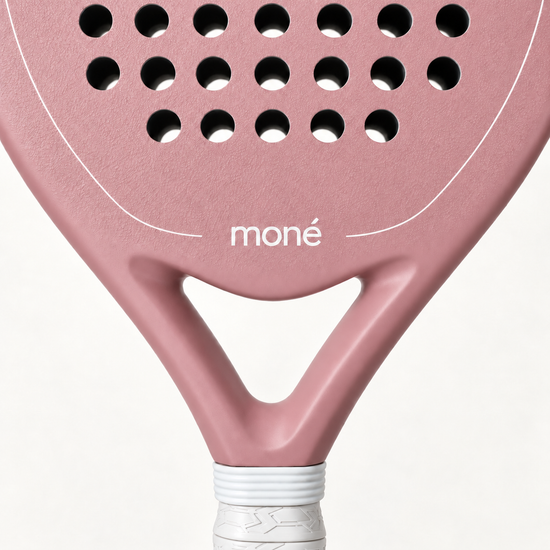 Open triangle throat and white logo of the pink Himalaya Hybrid padel racket, just above the grip