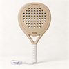 Sahara Hybrid padel racket by moné in beige, front view with a white grip and wrist strap on a light backdrop
