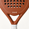 Close-up of the open throat and cream moné logo on the light brown face of the Sienna Hybrid padel racket