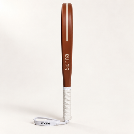 Terracotta Sienna Hybrid padel racket in side profile, with Sienna printed in cream along the frame and a white grip